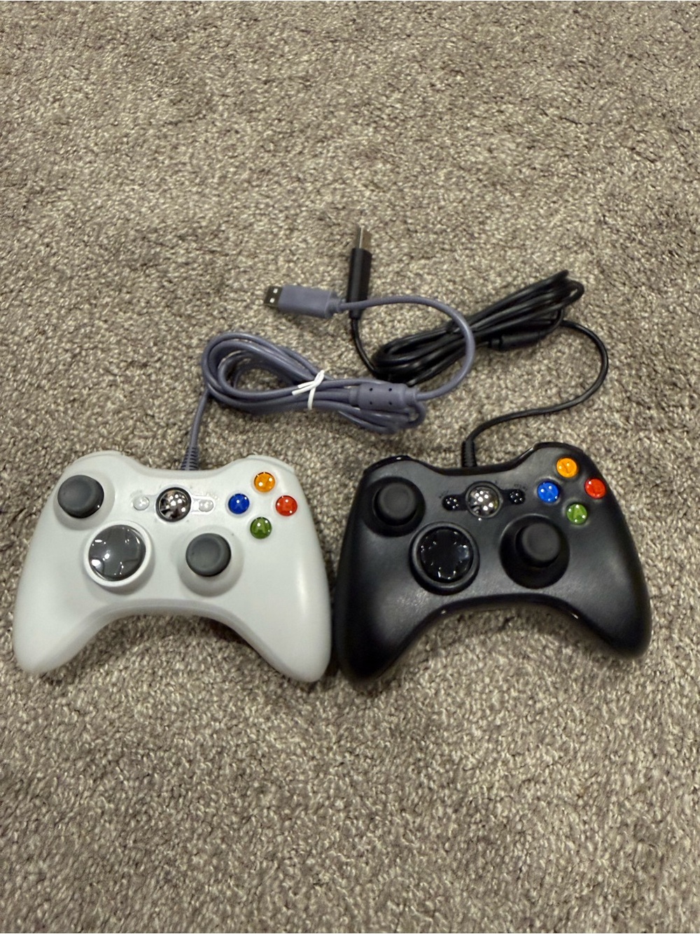 Wired Black and White aftermarket Xbox 360 controllers